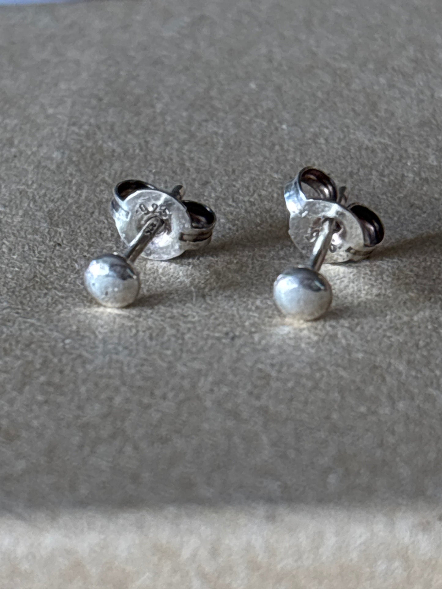 Tiny shiny studs