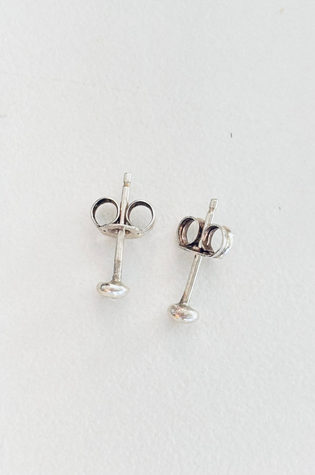 Tiny shiny studs