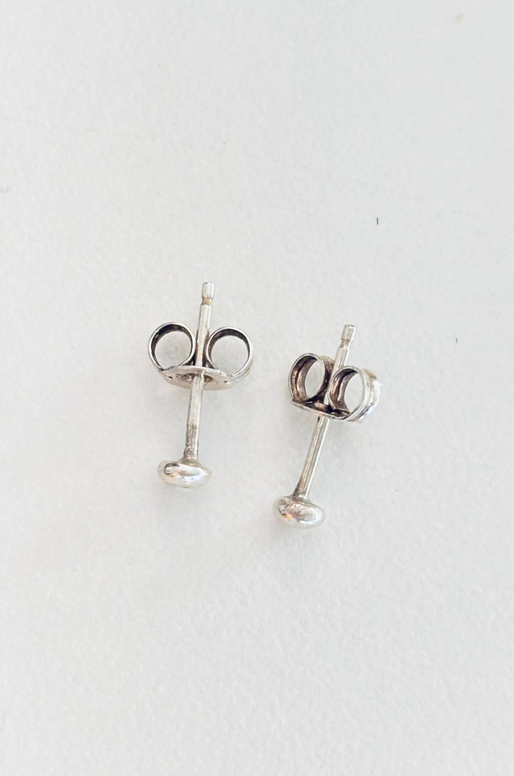 Tiny shiny studs