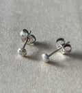 Tiny shiny studs (in stock)