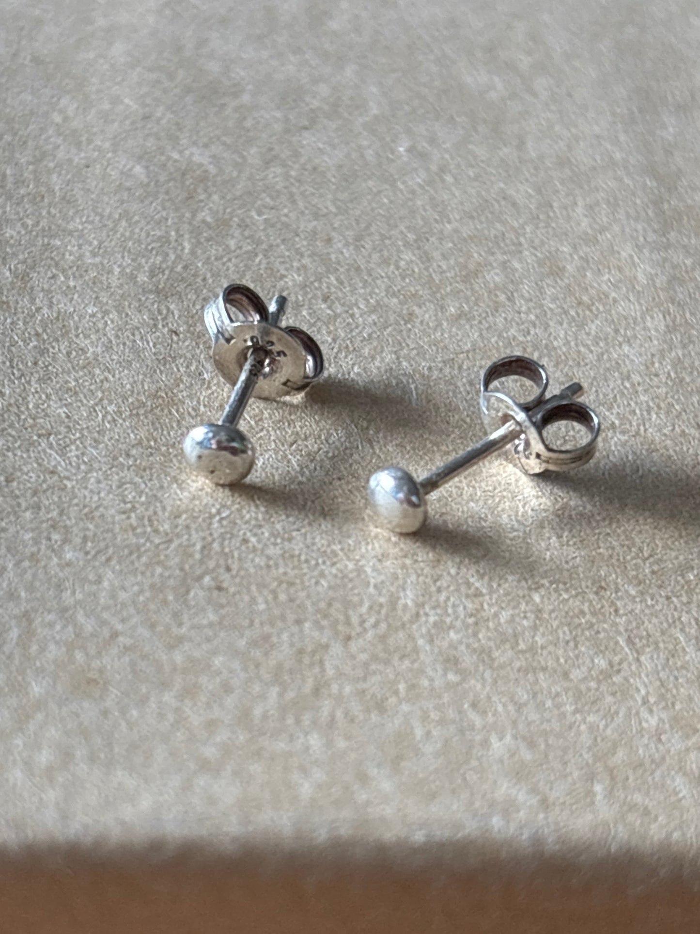 Tiny shiny studs