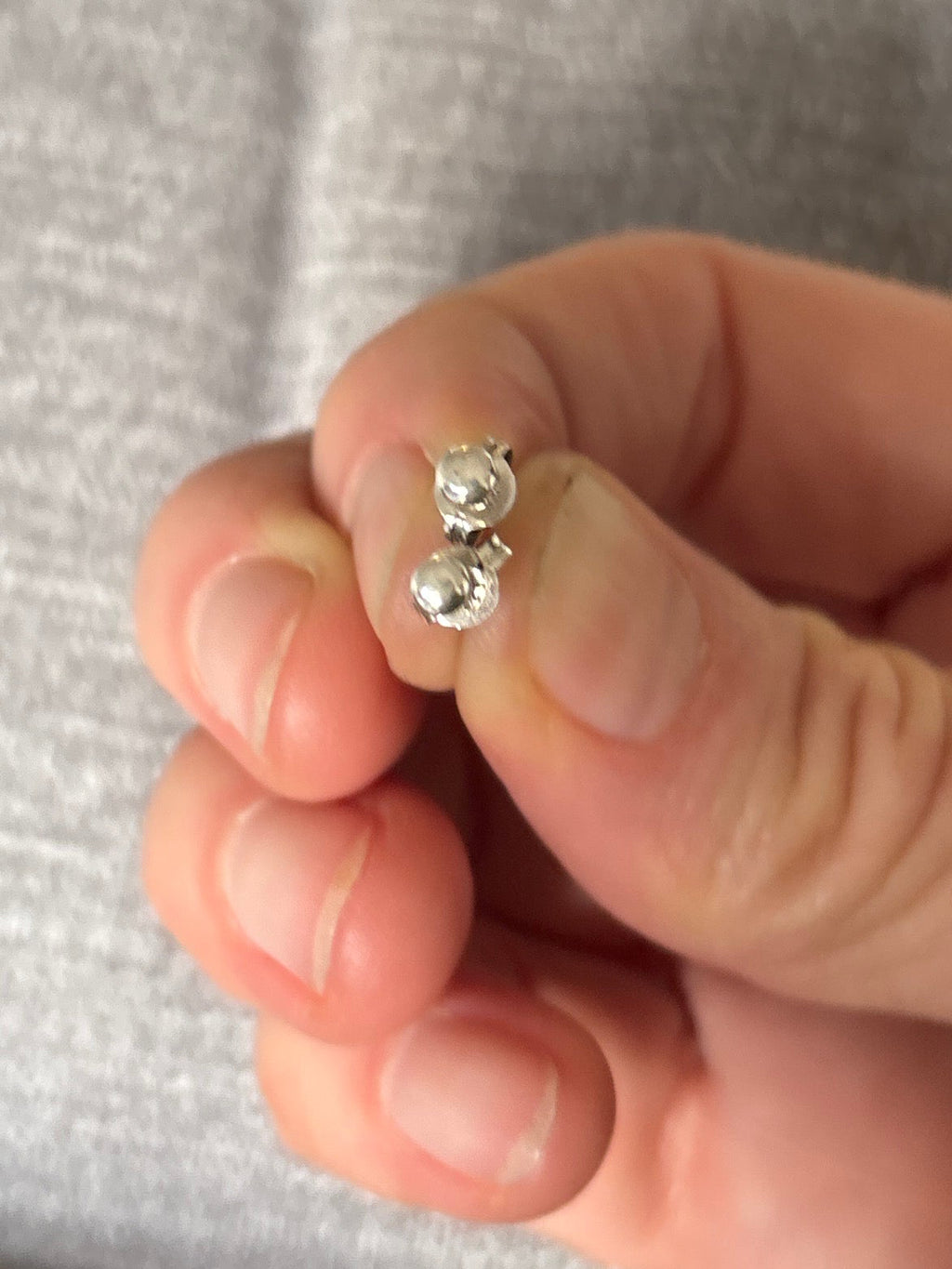 Tiny shiny studs (in stock)