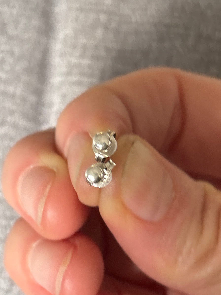 Tiny shiny studs